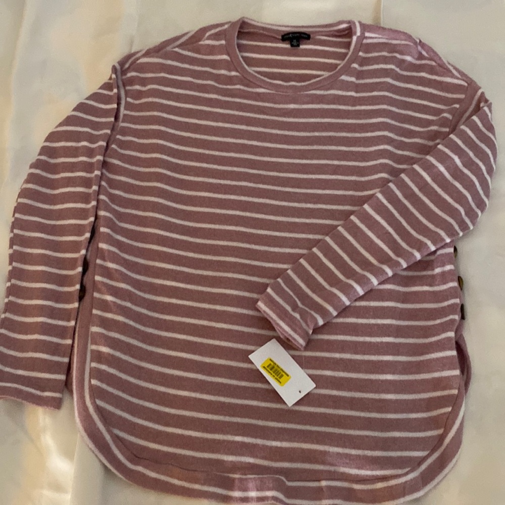 Dusky pink sweater.